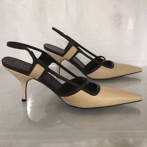 Beige and brown slingback pumps.
